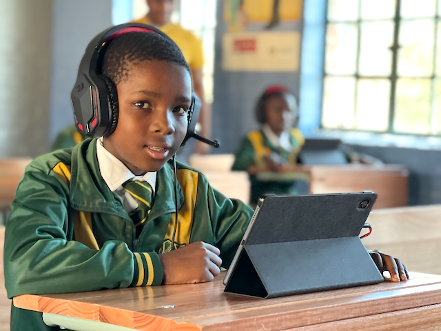 African Child receiving English Literacy Programme